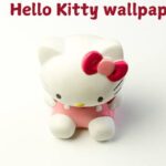 Cute Hello Kitty wallpaper design featuring pastel pink tones and bows.